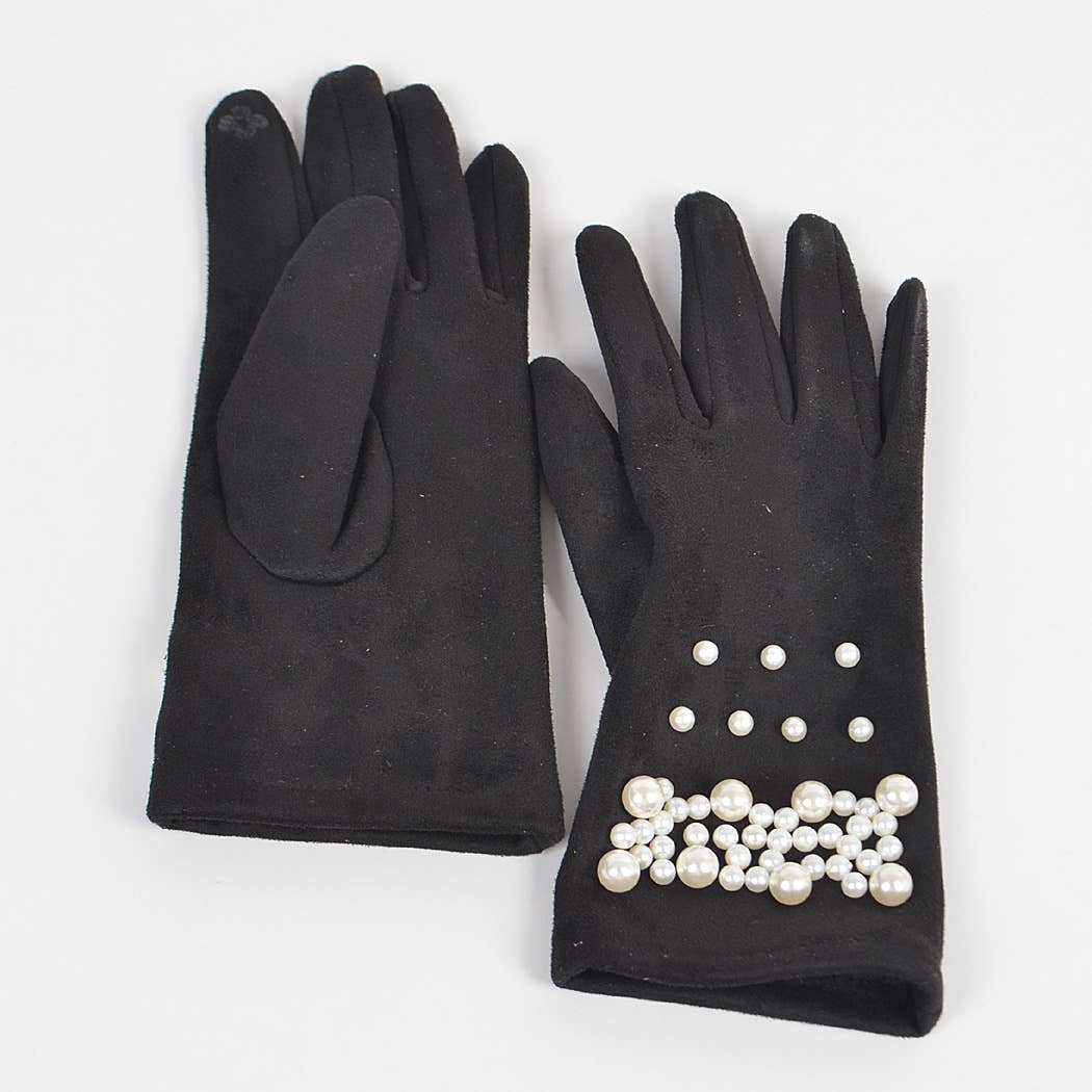 Black gloves with pearl embellishments on a white background