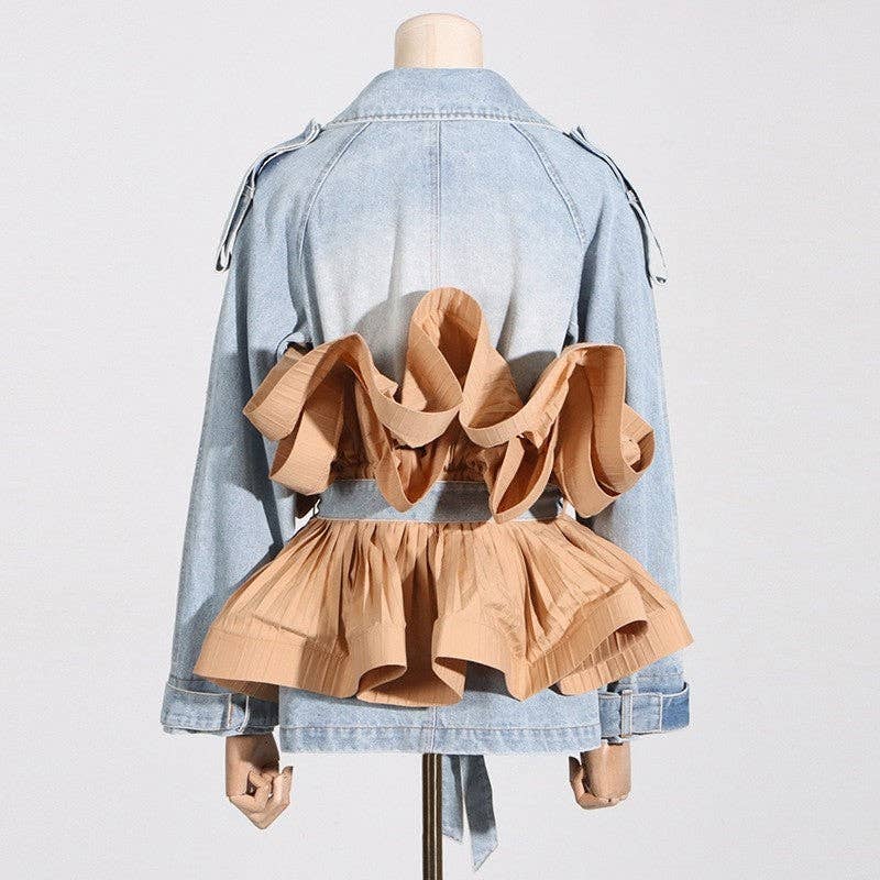 Denim jacket with ruffled beige top on a mannequin against a light gray background