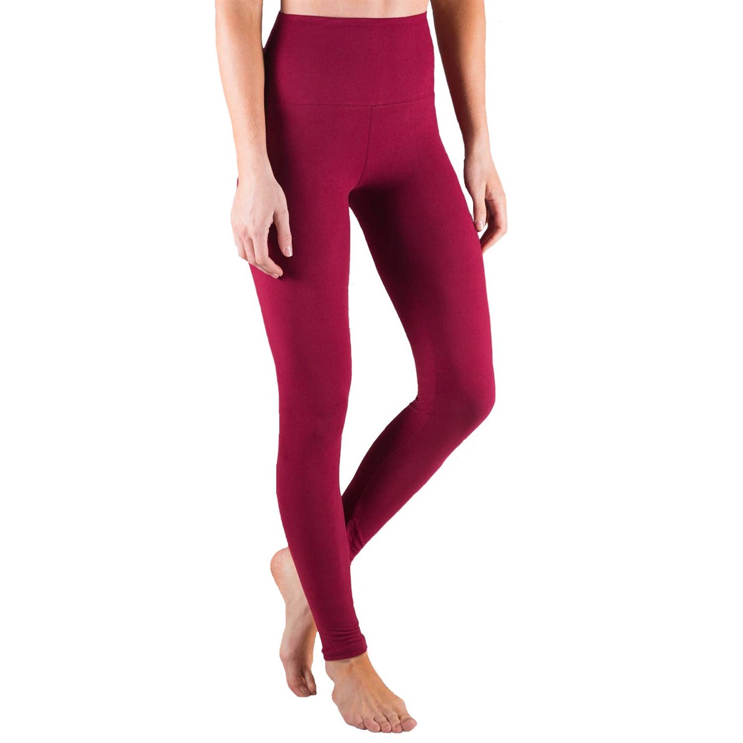 Maroon leggings worn by a person on a white background
