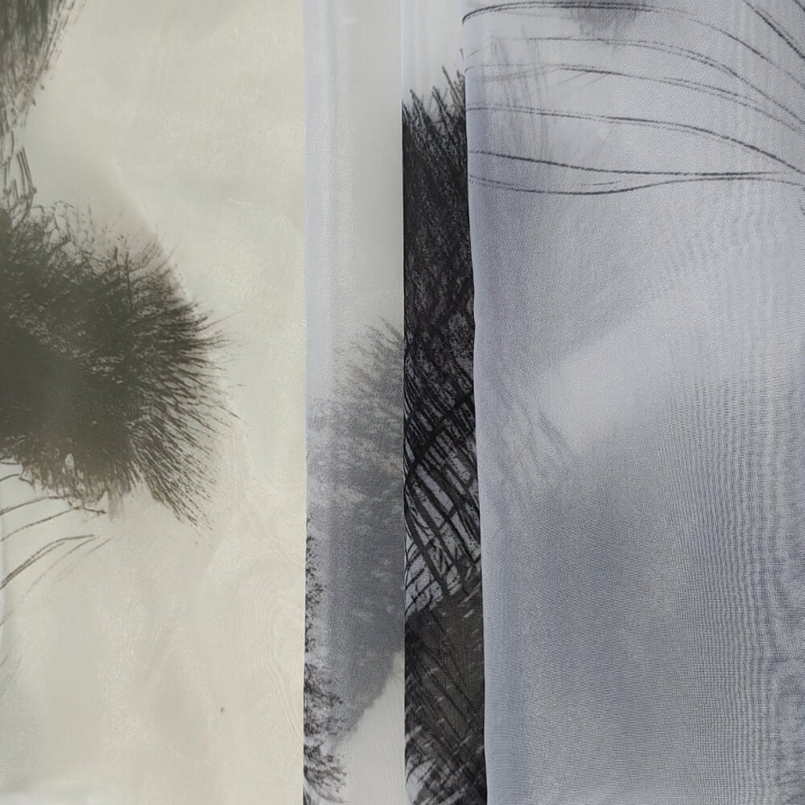 Close-up of fabric with abstract black and white patterns