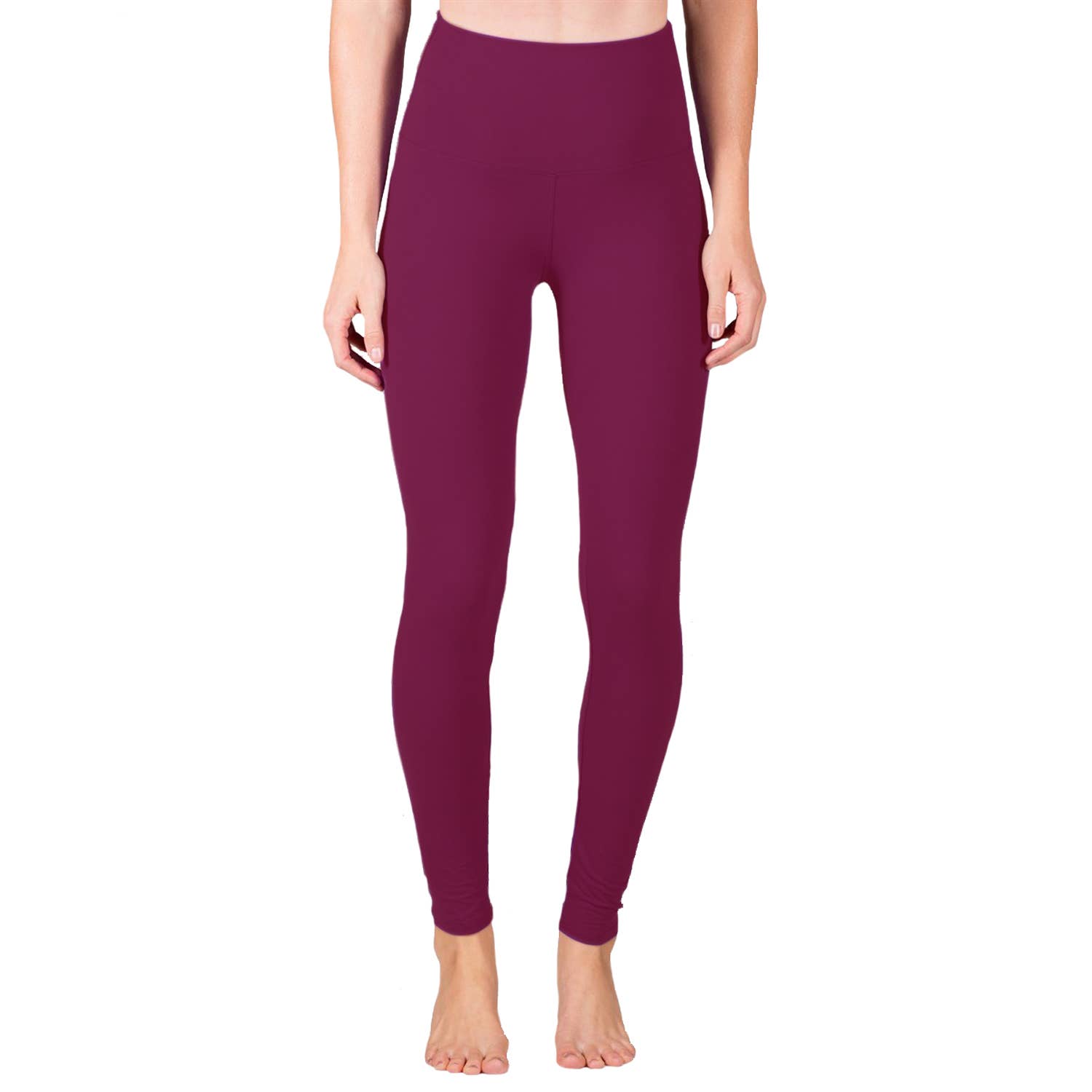 Maroon leggings worn by a person on a white background