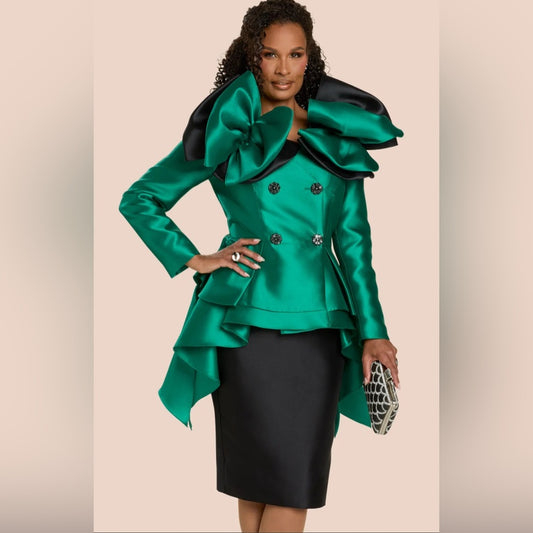 Woman wearing a green and black outfit with a large bow on a beige background