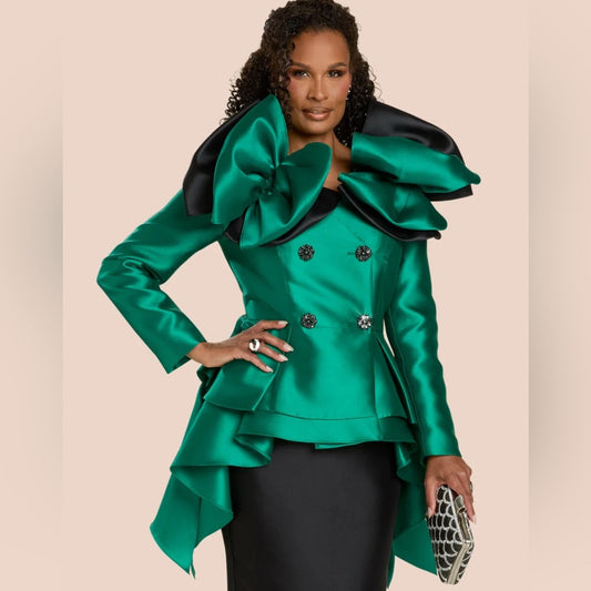 Woman wearing a green and black peplum jacket on a beige background