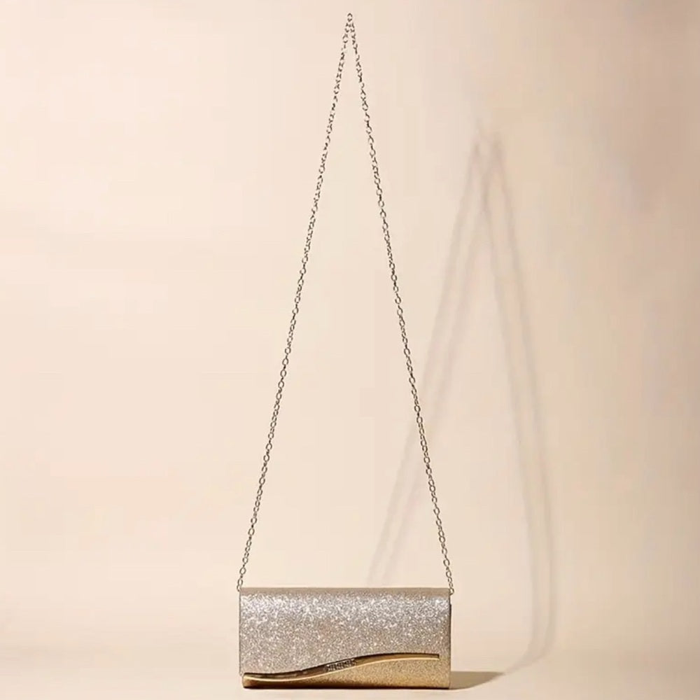 Sparkly handbag with a chain strap on a beige background