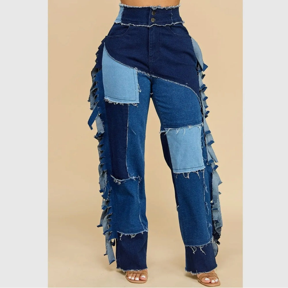 Patchwork jeans on a beige background