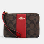 Load image into Gallery viewer, Corner Zip Wristlet In Signature Canvas - Passion of Essence Boutique
