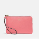 Load image into Gallery viewer, Coach Corner Zip Wristlet - Passion of Essence Boutique
